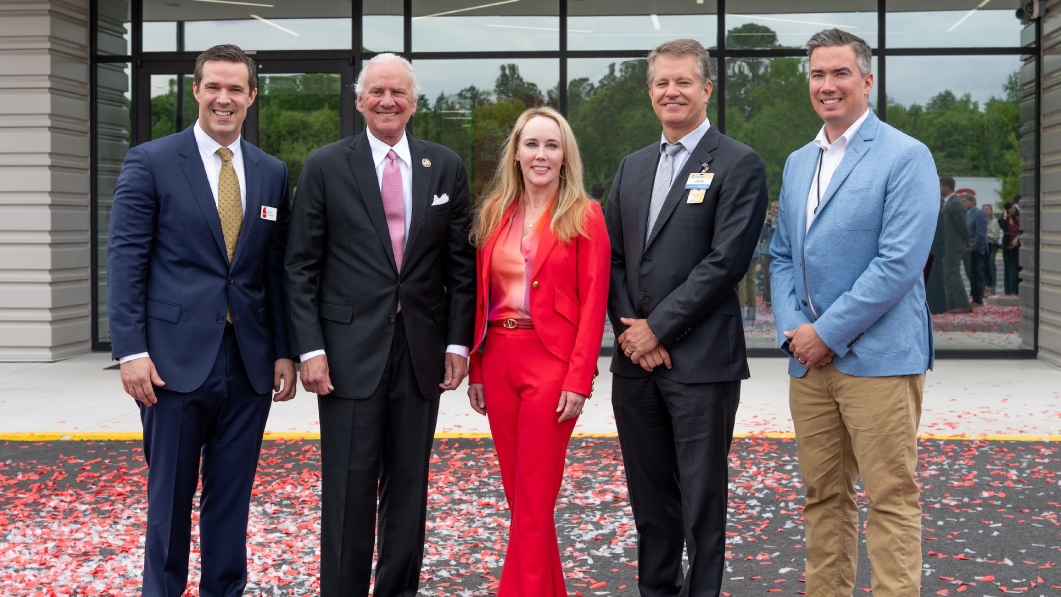 Photo of 5 entrepreneurs standing posing for the camera