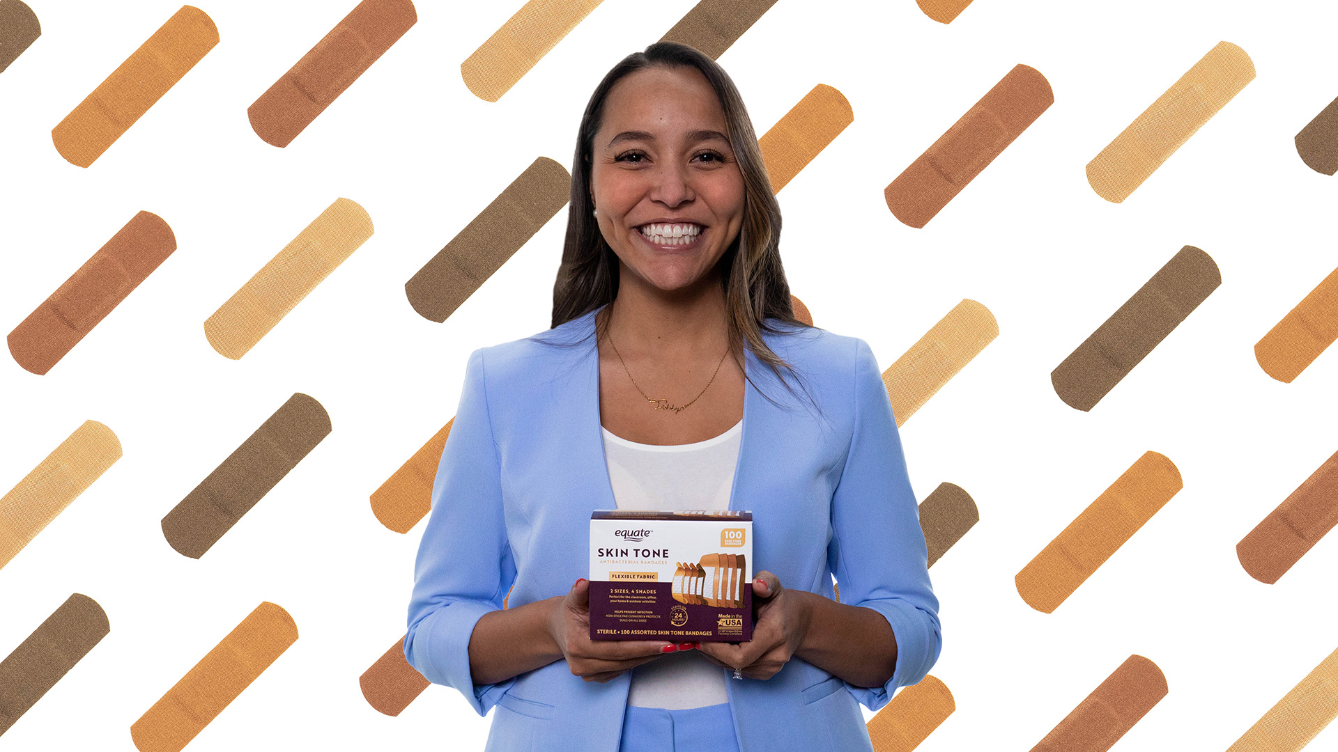 Health and wellness product developer Karrié holds the variety pack of skintone bandages she developed for Walmart.