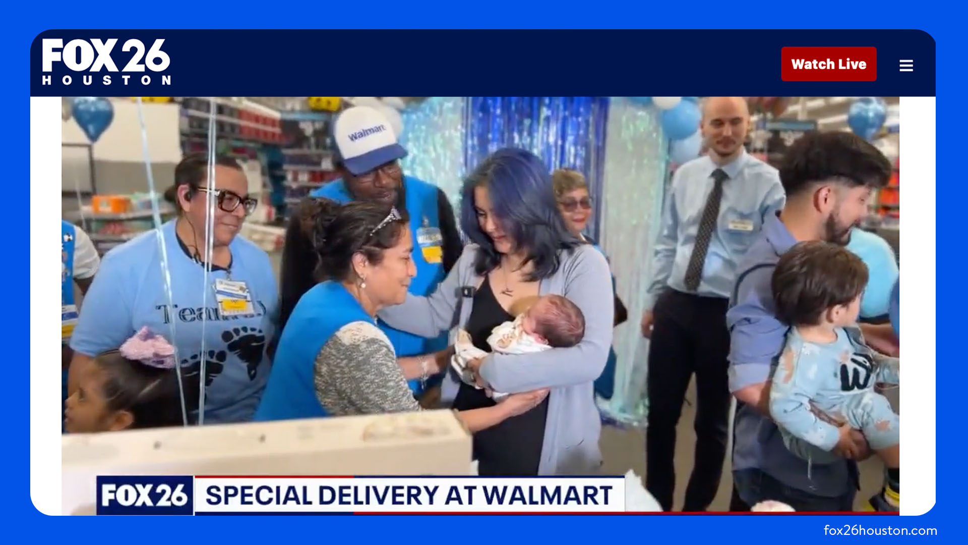 A picture of an online news article shows two Walmart associates.