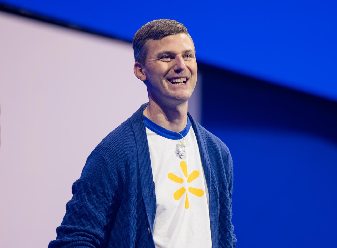 Executive Vice President, Supply Chain, Rob Montgomery smiles at the crowd at the Walmart U.S. Meeting at 2025 Associates Week.